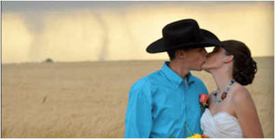 Tornado Backdrop in Kansas Wedding Photos. Oh my, do you think this is a sign of things to come? I think these are very memorable wedding photographs!