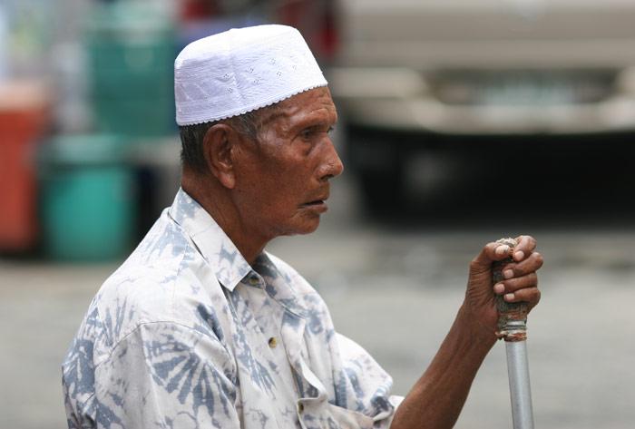 A Muslim man hanging out in in Sukhumvit Soi 3/1.