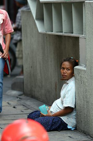 A very sad sight, a pregnant beggar.
