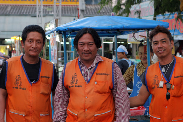 Three motorcycle taxi riders in downtown Korat. They leapt up from their game of draughts and asked me to photograph them, of which I was only too happy to oblige!